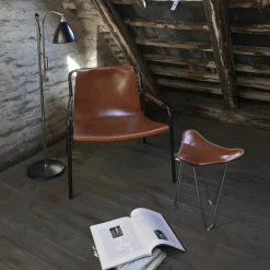 September loungestol Cognac-svartlackat stålstativ
